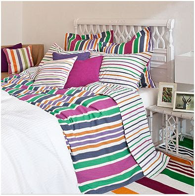 Rayas de colores para vestir y decorar las camas